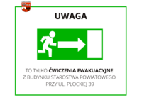 Grafika przedstawia znak drogi ewakuacyjnej z dopisaną informacją o ćwiczeniach ewakuacyjnych z budynku starostwa powiatowego.